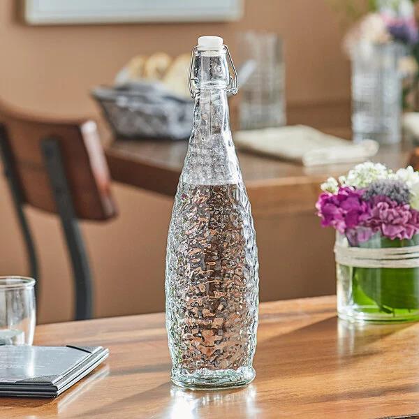 Where to rent WATER BOTTLE 32OZ W SWING TOP LID GLASS in Cornelius NC